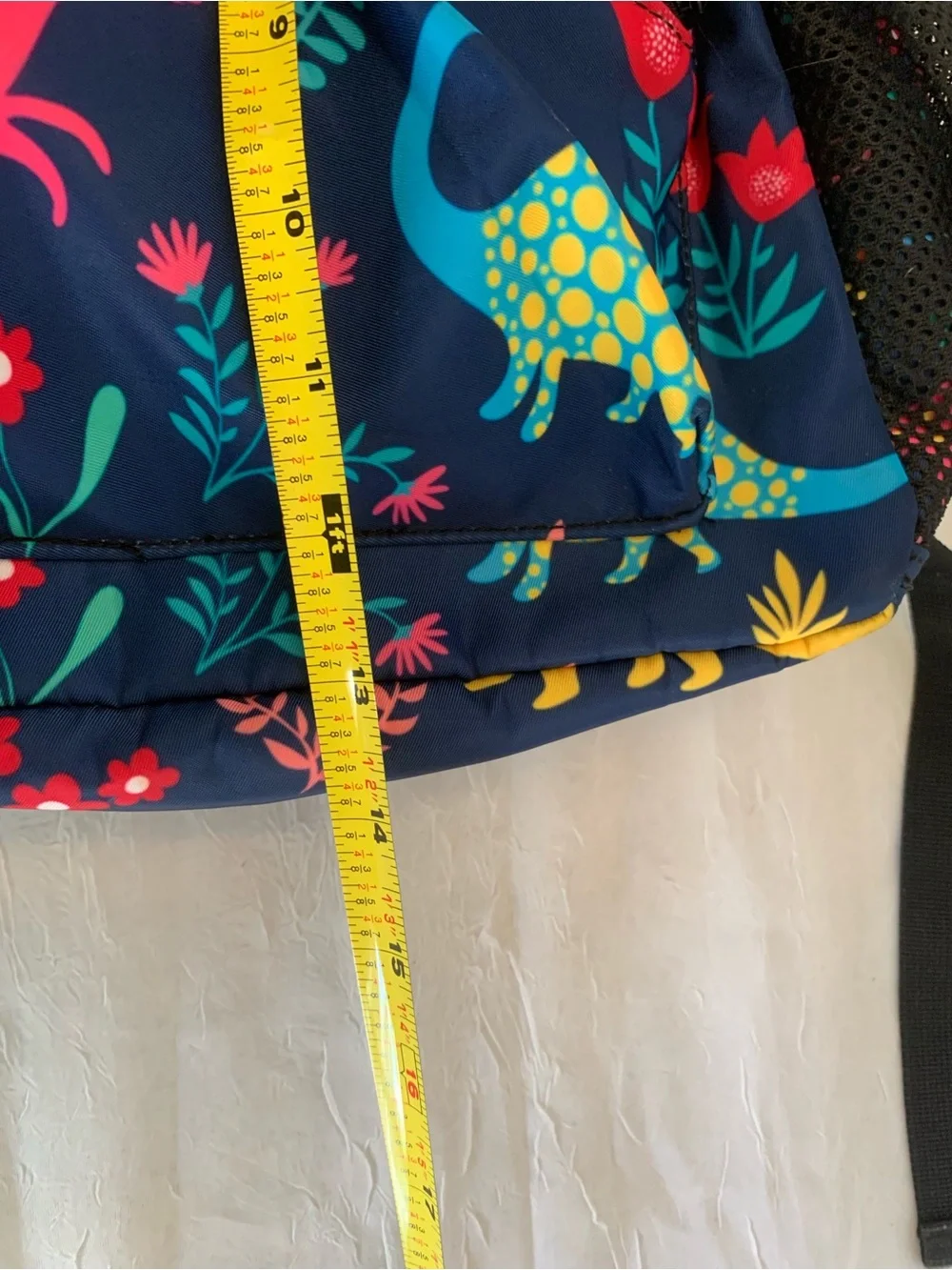 Child’s colorful dinosaur backpack